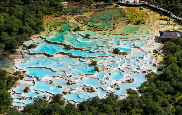 Huanglong:A Kaleidoscopio Viaje de Millennia-Old Travertine a un 